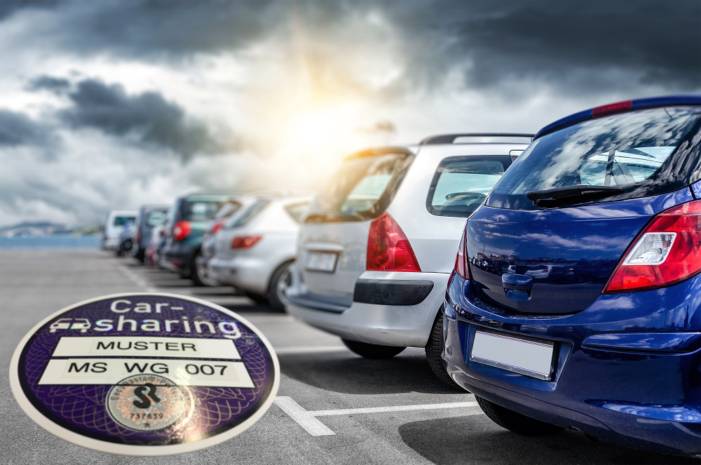 Witte Carsharing-Plakette